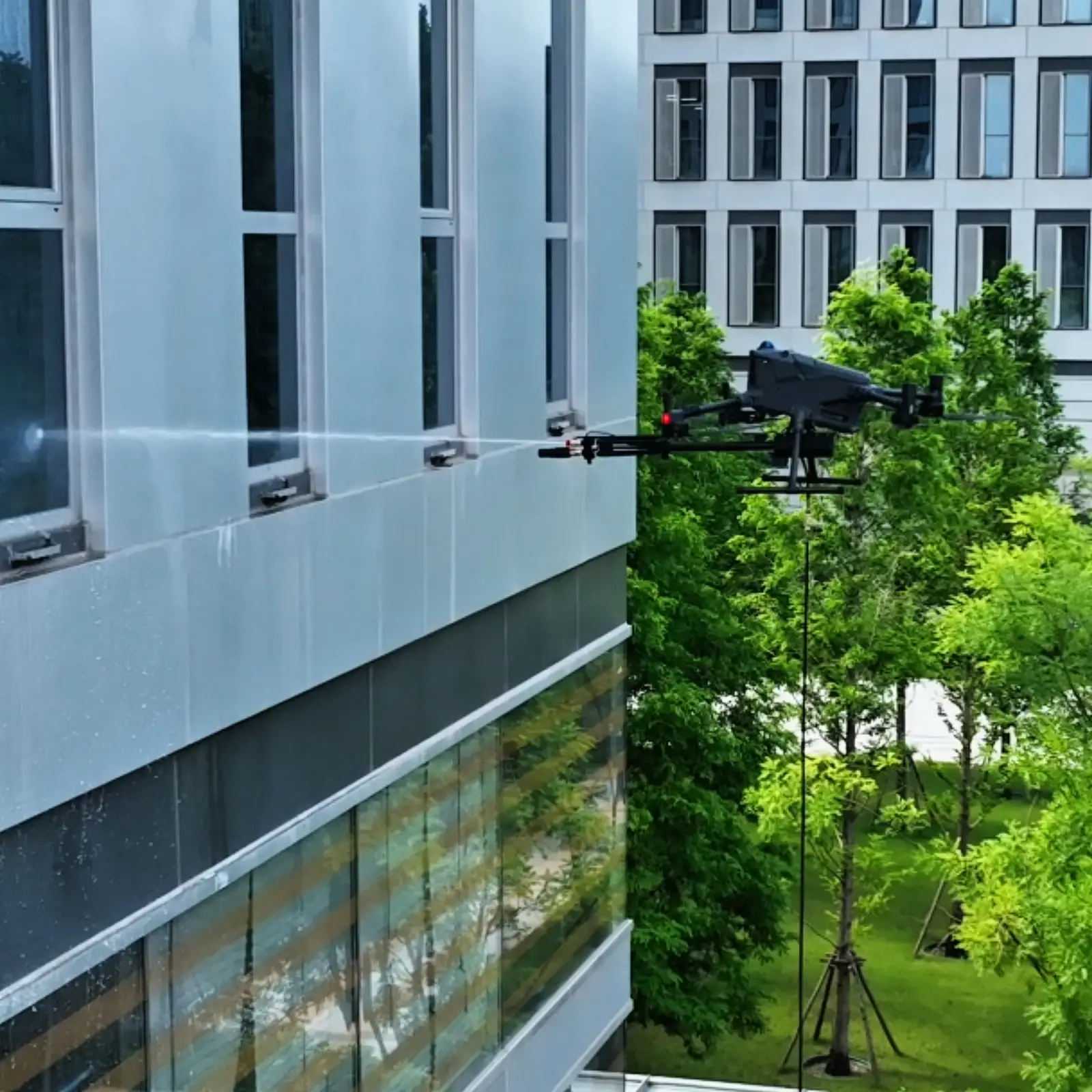 HoverWash 3 pressure washing pass on a building exterior